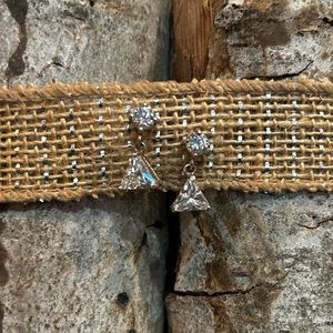 Sterling Silver earring w/ round & triangle CZ stone.